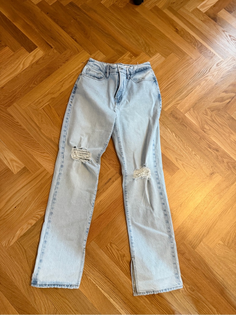 Good American Light Blue Flare Jeans with Knee Distress